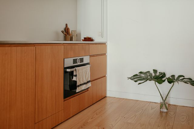 A run of timber kitchen cabinetry, from the Rivet & Pine Carpentry example site